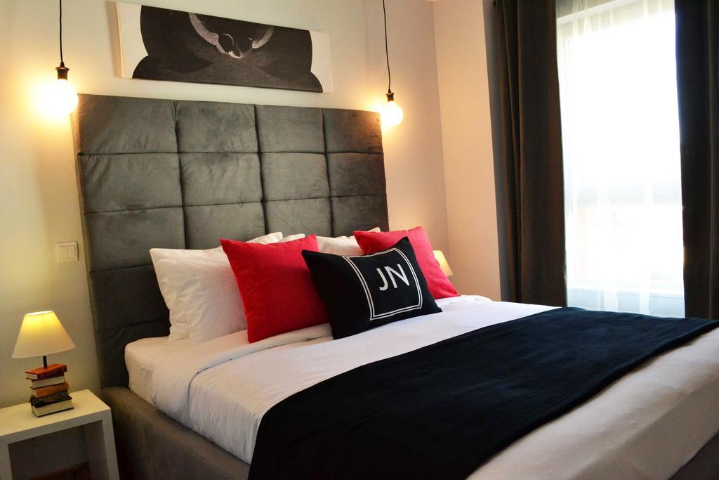 Jn Boutique Apartments Бухарест Номер фото