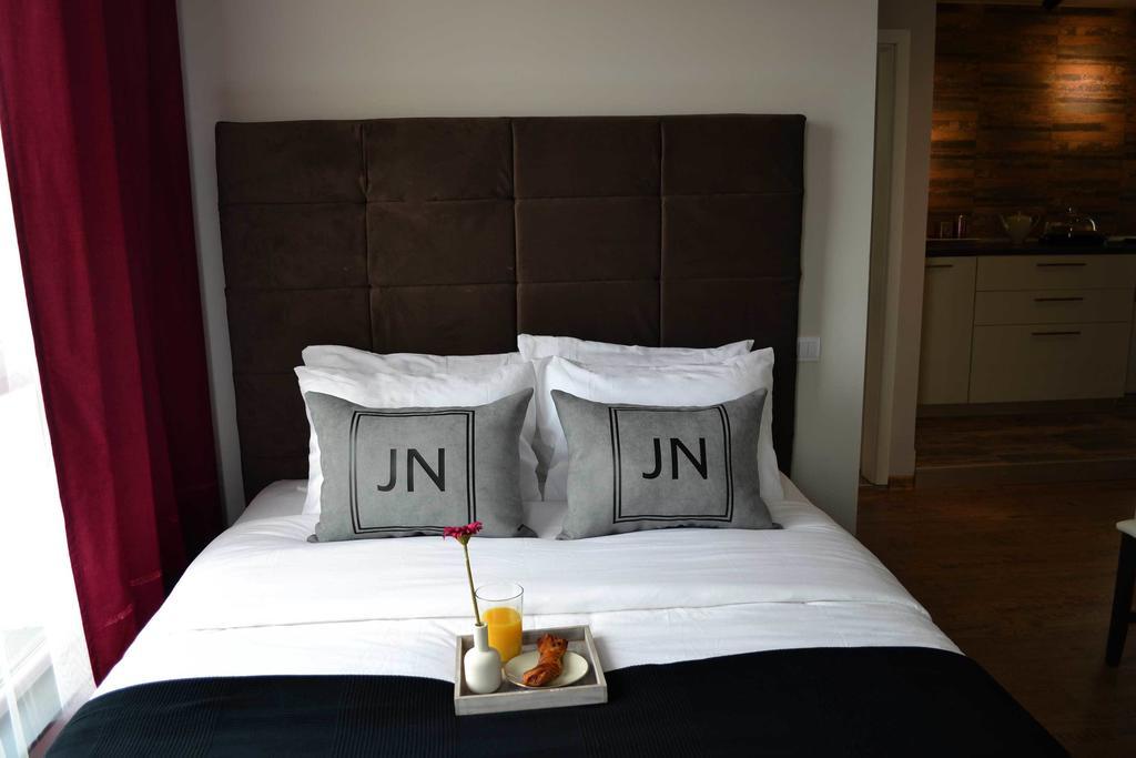 Jn Boutique Apartments Бухарест Номер фото