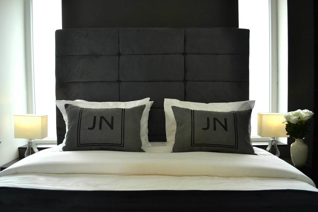 Jn Boutique Apartments Бухарест Номер фото